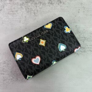 NWT MICHAEL KORS OUTLET
Jet Set Medium Printed Signature Logo Wallet